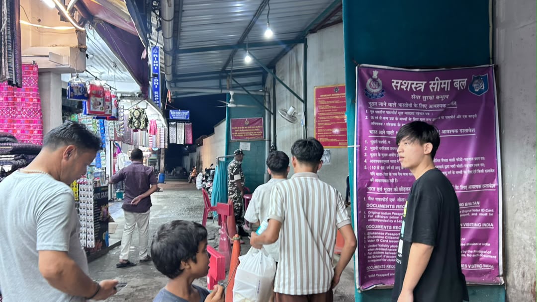 Jaigaon market street at night with shopfronts
