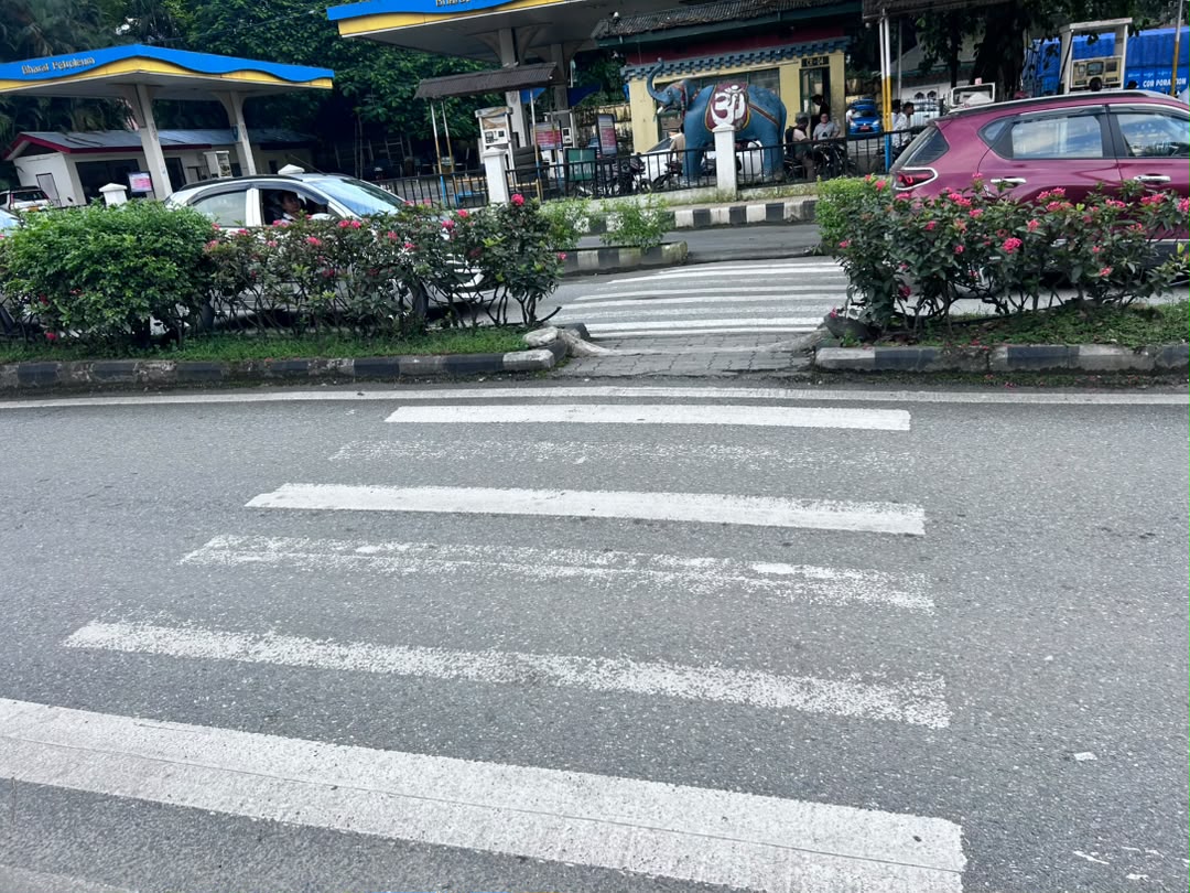 Crosswalk near the gate with a petrol station